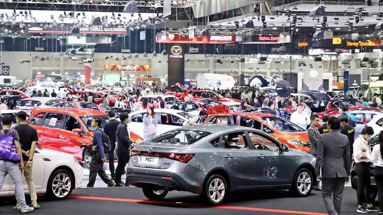 overhead view of corned beef sliced and on a platter with cabbage, potatoes, and carrots