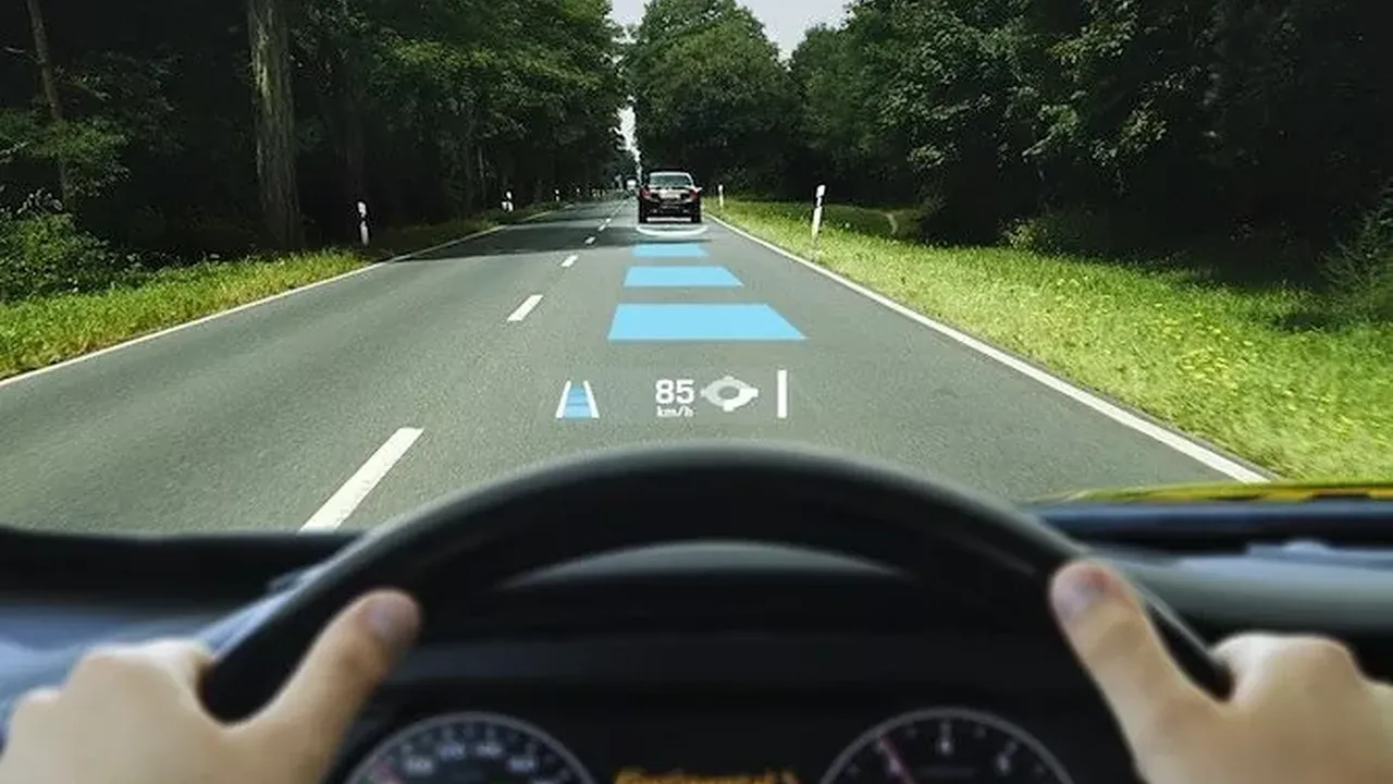 overhead view of corned beef sliced and on a platter with cabbage, potatoes, and carrots
