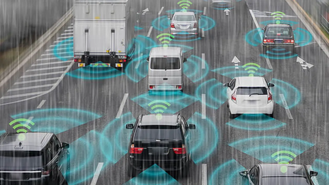 blue bowl of black bean beef tortilla soup on a board with cilantro and shredded cheese in background