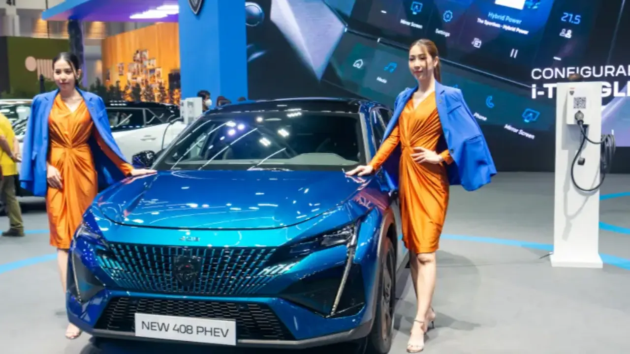 Close up on a plate of mashed potatoes, topped with baked pork chops with cream of mushroom soup, and a side of green beans.